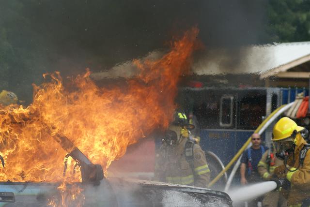 Christina Barbour on nozzle, attacks vehicle fire during training exercise in Keeseville NY 8/21/2010